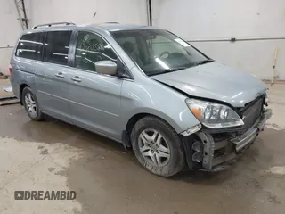 2006 Honda Odyssey EX with VIN 5FNRL38446B044231, listed as a IAAI auction lot 42080586 with 211,908 mi miles. Bid and sale history available at carsss.com. Image 1.