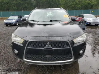 2010 Mitsubishi Outlander XLS with VIN JA4JT4AX4AZ009743, listed as a Copart auction lot 52824925 with 117,984 mi miles and Clean Title. Bid and sale history available at carsss.com. Image 5.