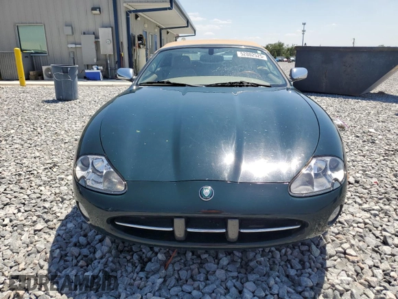 2002 Jaguar XK with VIN SAJDA42C62NA25816, listed as a Copart auction lot 52802525 with Not Provided miles and Salvage Title. Bid and sale history available at DreamBid. Image 5.