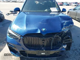 2021 BMW X5 xDrive45e with VIN 5UXTA6C06M9F65364, listed as a IAAI auction lot 41243236 with 1 mi miles. Bid and sale history available at carsss.com. Image 13.