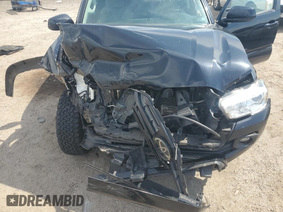 2019 Toyota Tacoma SR z VIN 3TMCZ5AN9KM283203, wystawiony jako Copart lot #55325915 z przebiegiem 116 318 mil mil oraz Szkoda całkowita • Salvage title. Historia ofert i sprzedaży dostępna na DreamBid. Obrazek 11.