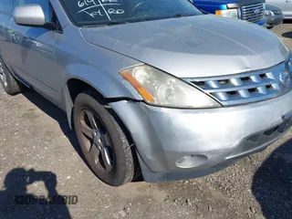 2005 Nissan Murano SL z VIN JN8AZ08W55W432899, wystawiony jako IAAI lot #42239445 z przebiegiem 146 619 mil mil oraz . Historia ofert i sprzedaży dostępna na DreamBid. Obrazek 6.