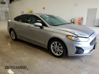 2020 Ford Fusion SE z VIN 3FA6P0LUXLR194471, wystawiony jako Copart lot #55616175 z przebiegiem 94 169 mil mil oraz Tytuł czysty. Historia ofert i sprzedaży dostępna na DreamBid. Obrazek 4.