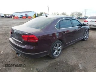 2014 Volkswagen Passat SEL Premium with VIN 1VWCS7A37EC022413, listed as a IAAI auction lot 40597042 with 131,866 mi miles. Bid and sale history available at carsss.com. Image 4.