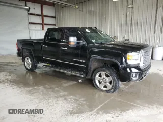 2016 GMC Sierra 2500HD Denali z VIN 1GT12UE84GF275611, wystawiony jako Copart lot #52740225 z przebiegiem 135 747 mil mil oraz Szkoda całkowita • Salvage title. Historia ofert i sprzedaży dostępna na DreamBid. Obrazek 4.