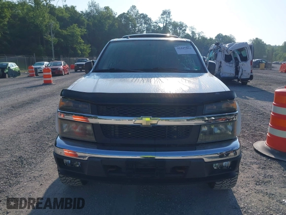 2007 Chevrolet Colorado 1LT z VIN 1GCDT13E978249656, wystawiony jako IAAI lot #42445862 z przebiegiem 115 298 mil mil oraz . Historia ofert i sprzedaży dostępna na DreamBid. Obrazek 12.
