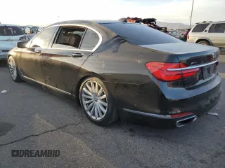 2017 BMW 7 Series 740i with VIN WBA7E2C30HG740620, listed as a Copart auction lot 85750464 with 116,850 mi miles and Salvage Title. Bid and sale history available at carsss.com. Image 2.