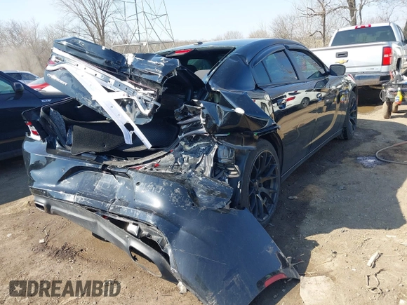 2019 Dodge Charger SXT with VIN 2C3CDXBG9KH580890, listed as a IAAI auction lot 41793008 with 52,497 mi miles. Bid and sale history available at carsss.com. Image 4.