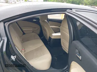 2013 Dodge Charger SE z VIN 2C3CDXBG4DH522639, wystawiony jako IAAI lot #42220383 z przebiegiem 164 319 mil mil oraz . Historia ofert i sprzedaży dostępna na DreamBid. Obrazek 8.