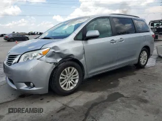 2016 Toyota Sienna XLE with VIN 5TDYK3DC6GS740193, listed as a Copart auction lot 62711185 with 158,696 mi miles and Salvage title. Bid and sale history available at DreamBid. Image 1.