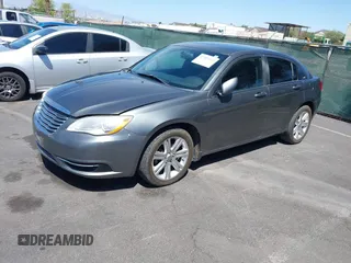 2013 Chrysler 200 Touring with VIN 1C3CCBBB1DN594870, listed as a IAAI auction lot 42207111 with 109,815 mi miles and . Bid and sale history available at DreamBid. Image 2.