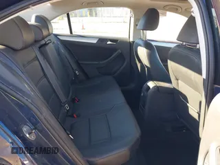 2013 Volkswagen Jetta Sedan SE w/Convenience/Sunroof with VIN 3VWBP7AJ2DM387560, listed as a IAAI auction lot 39266996 with 136,636 mi miles. Bid and sale history available at carsss.com. Image 8.
