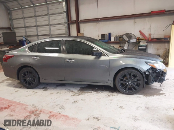 2018 Nissan Altima SR with VIN 1N4AL3AP1JC175694, listed as a IAAI auction lot 42006589 with 89,386 mi miles and . Bid and sale history available at carsss.com. Image 13.