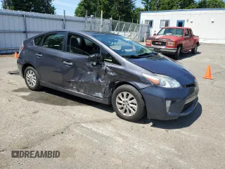 2013 Toyota Prius z VIN JTDKN3DP1D3041163, wystawiony jako Copart lot #59523955 z przebiegiem Nie podano mil oraz Szkoda całkowita • Salvage title. Historia ofert i sprzedaży dostępna na DreamBid. Obrazek 4.