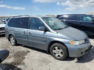 2000 Honda Odyssey EX with VIN 2HKRL1860YH532814, listed as a Copart auction lot 51780855 with 186,328 mi miles and Salvage Title. Bid and sale history available at DreamBid. Image 4.