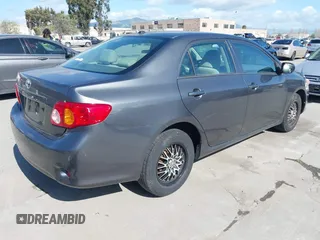 2010 Toyota Corolla with VIN 2T1BU4EE4AC489972, listed as a IAAI auction lot 41955399 with 139,270 mi miles. Bid and sale history available at carsss.com. Image 4.