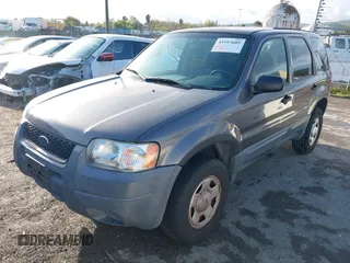 2004 Ford Escape with VIN 1FMCU02174KA61956, listed as a IAAI auction lot 41913605 with 166,587 mi miles and . Bid and sale history available at DreamBid. Image 2.