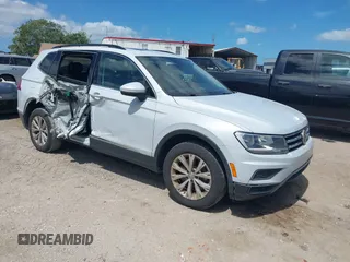 2018 Volkswagen Tiguan SEL with VIN 3VV3B7AX5JM053045, listed as a IAAI auction lot 41963017 with 77,495 mi miles and . Bid and sale history available at DreamBid. Image 1.