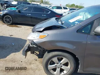2016 Toyota Sienna LE AAS with VIN 5TDKK3DC1GS714039, listed as a IAAI auction lot 41868423 with 150,817 mi miles. Bid and sale history available at carsss.com. Image 6.
