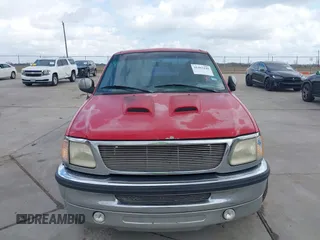 1998 Ford F-150 with VIN 1FTZX1720WNC10500, listed as a IAAI auction lot 41462145 with 266,150 mi miles and . Bid and sale history available at DreamBid. Image 6.