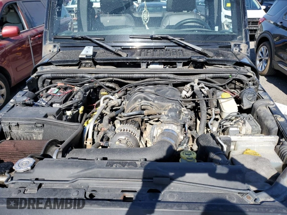 2015 Jeep Wrangler Unlimited Freedom with VIN 1C4BJWDG8FL689194, listed as a Copart auction lot 58016385 with 108,026 mi miles and Salvage title. Bid and sale history available at DreamBid. Image 11.