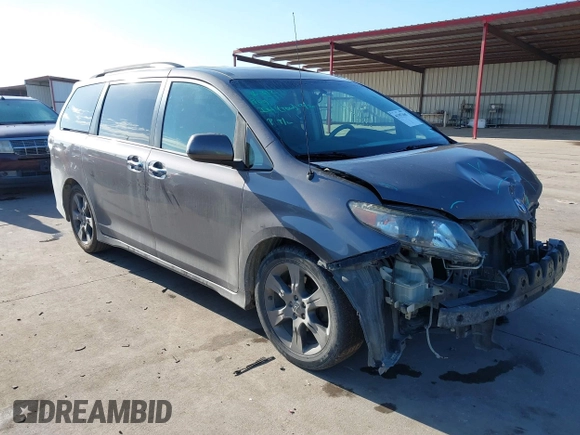 2014 Toyota Sienna SE with VIN 5TDXK3DC7ES482954, listed as a IAAI auction lot 41197465 with 160,107 mi miles and . Bid and sale history available at DreamBid. Image 1.
