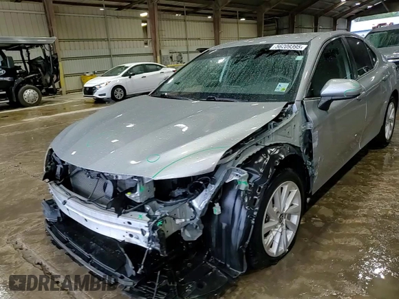 2023 Toyota Camry LE z VIN 4T1C11AK6PU082458, wystawiony jako Copart lot #56209395 z przebiegiem 38 806 mil mil oraz Szkoda całkowita • Salvage title. Historia ofert i sprzedaży dostępna na DreamBid. Obrazek 13.