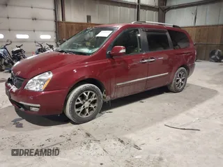 2014 Kia Sedona EX with VIN KNDMH4C74E6547870, listed as a IAAI auction lot 41403040 with 156,005 mi miles. Bid and sale history available at carsss.com. Image 2.