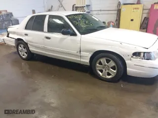 2004 Ford Crown Victoria LX with VIN 2FAFP74W14X110484, listed as a IAAI auction lot 41736140 with 220,067 mi miles. Bid and sale history available at carsss.com. Image 6.
