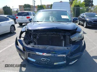 2019 Infiniti QX60 LUXE with VIN 5N1DL0MN9KC559199, listed as a IAAI auction lot 41931773 with 111,569 mi miles. Bid and sale history available at carsss.com. Image 13.