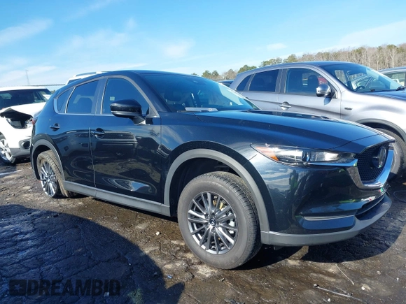 2021 Mazda CX-5 Touring with VIN JM3KFBCM9M0483082, listed as a IAAI auction lot 41305127 with 42,926 mi miles. Bid and sale history available at carsss.com. Image 13.