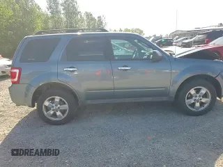 2012 Ford Escape XLT z VIN 1FMCU9DG1CKC54737, wystawiony jako Copart lot #59902055 z przebiegiem 206 067 mil mil oraz Szkoda całkowita • Salvage title. Historia ofert i sprzedaży dostępna na DreamBid. Obrazek 14.