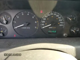 2004 Jeep Grand Cherokee Laredo z VIN 1J4GW48S84C200617, wystawiony jako Copart lot #51732045 z przebiegiem 171 452 mil mil oraz Nie do naprawy • Non repairable. Historia ofert i sprzedaży dostępna na DreamBid. Obrazek 9.