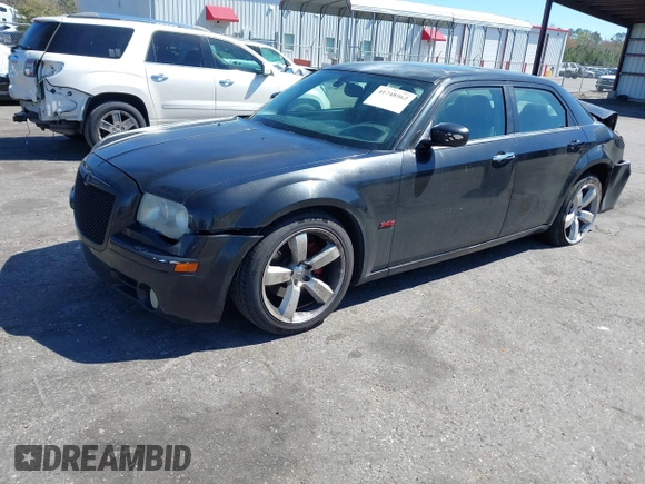 2005 Chrysler 300 with VIN 2C3AA63HX5H649107, listed as a IAAI auction lot 41748562 with 173,803 mi miles. Bid and sale history available at carsss.com. Image 17.