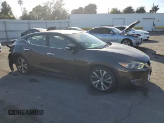 2016 Nissan Maxima SL with VIN 1N4AA6AP4GC900754, listed as a Copart auction lot 60664465 with 72,218 mi miles and Salvage title. Bid and sale history available at DreamBid. Image 4.