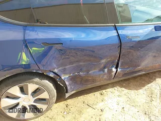 2022 Tesla Model Y Long Range z VIN 7SAYGDEE0NF429399, wystawiony jako IAAI lot #42333630 z przebiegiem 32 937 mil mil oraz . Historia ofert i sprzedaży dostępna na DreamBid. Obrazek 6.