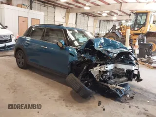 2022 MINI Hardtop 4 Door Cooper z VIN WMW33DK03N2R03891, wystawiony jako IAAI lot #41607587 z przebiegiem Nie podano mil oraz . Historia ofert i sprzedaży dostępna na DreamBid. Obrazek 1.