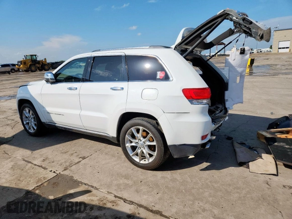 2014 Jeep Grand Cherokee Summit with VIN 1C4RJFJG9EC338666, listed as a Copart auction lot 63834075 with 196,840 mi miles and Salvage title. Bid and sale history available at DreamBid. Image 2.
