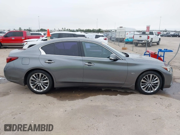 2019 Infiniti Q50 3.0t LUXE with VIN JN1EV7AP6KM511156, listed as a IAAI auction lot 41576308 with 63,620 mi miles. Bid and sale history available at carsss.com. Image 14.