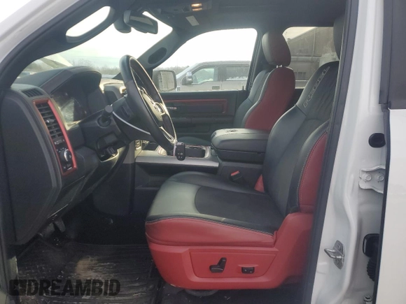 2016 Ram 1500 Rebel z VIN 1C6RR7YT3GS385998, wystawiony jako Copart lot #88633265 z przebiegiem 133 802 mil mil oraz Szkody całkowita. Historia ofert i sprzedaży dostępna na DreamBid. Obrazek 7.