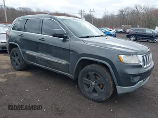 2011 Jeep Grand Cherokee Laredo with VIN 1J4RR4GGXBC597743, listed as a IAAI auction lot 41897286 with 253,111 mi miles and . Bid and sale history available at DreamBid. Image 1.