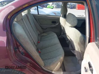 2001 Hyundai Elantra GLS z VIN KMHDN45DX1U085019, wystawiony jako IAAI lot #42045813 z przebiegiem 240 444 mil mil oraz . Historia ofert i sprzedaży dostępna na DreamBid. Obrazek 8.