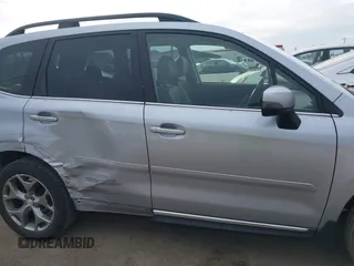 2016 Subaru Forester 2.5i Touring with VIN JF2SJAXCXGH522837, listed as a IAAI auction lot 41562541 with 106,720 mi miles. Bid and sale history available at carsss.com. Image 14.