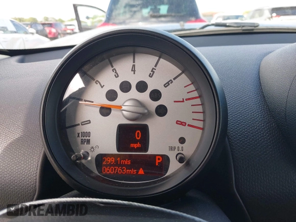 2013 MINI Countryman with VIN WMWZB3C58DWM07817, listed as a IAAI auction lot 41962291 with 60,763 mi miles and . Bid and sale history available at DreamBid. Image 7.