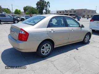 2005 Kia Spectra LX z VIN KNAFE122355118194, wystawiony jako IAAI lot #42454058 z przebiegiem 125 456 mil mil oraz . Historia ofert i sprzedaży dostępna na DreamBid. Obrazek 4.