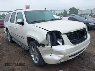 2012 GMC Yukon XL SLT z VIN 1GKS2LE74CR100522, wystawiony jako IAAI lot #42149135 z przebiegiem 274 117 mil mil oraz . Historia ofert i sprzedaży dostępna na DreamBid. Obrazek 1.