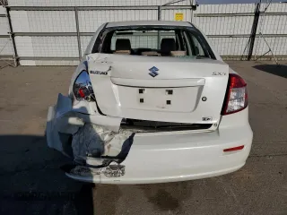 2009 Suzuki SX4 Man FWD with VIN JS2YC412796200908, listed as a Copart auction lot 73821924 with 125,721 mi miles and Salvage Title. Bid and sale history available at carsss.com. Image 6.