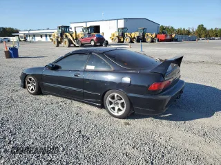 2001 Acura Integra LS with VIN JH4DC43561S004050, listed as a Copart auction lot 76619944 with 210,876 mi miles and Salvage Title. Bid and sale history available at carsss.com. Image 2.