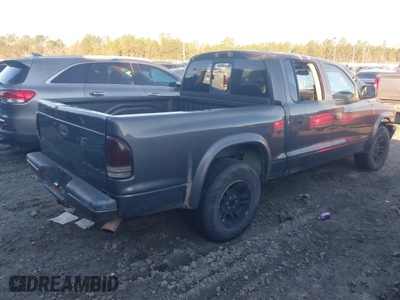 2003 Dodge Dakota Sport with VIN 1D7HL38NX3S190271, listed as a IAAI auction lot 41264054 with 139,498 mi miles. Bid and sale history available at carsss.com. Image 4.