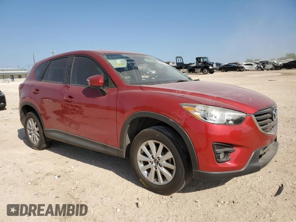 2016 Mazda CX-5 Touring with VIN JM3KE2CYXG0638247, listed as a Copart auction lot 53087305 with 0 mi miles and Salvage Title. Bid and sale history available at carsss.com. Image 4.